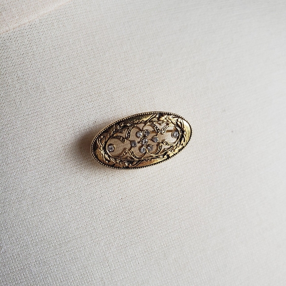 Vintage gold toned floral brooch with rhinestones - Picture 3 of 4